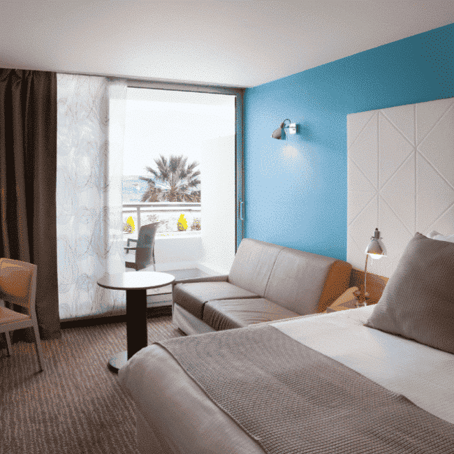 chambre bleue deluxe rideau tête de lit graphique moderne couleur bassin arcachon hôtel