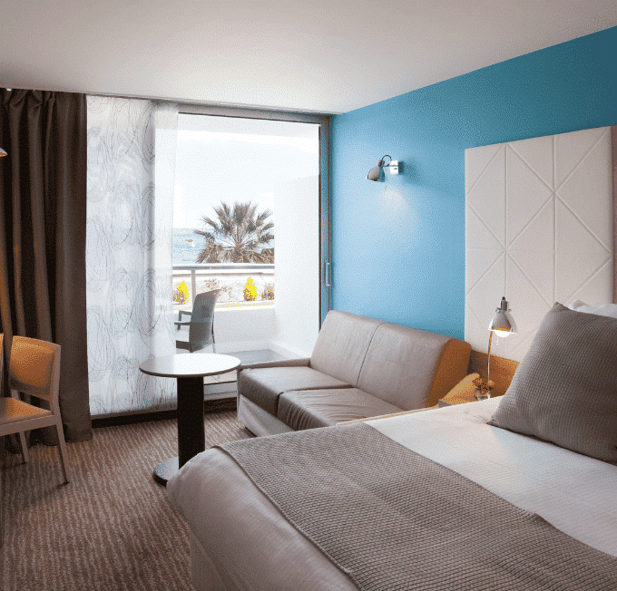 chambre bleue deluxe rideau tête de lit graphique moderne couleur bassin arcachon hôtel